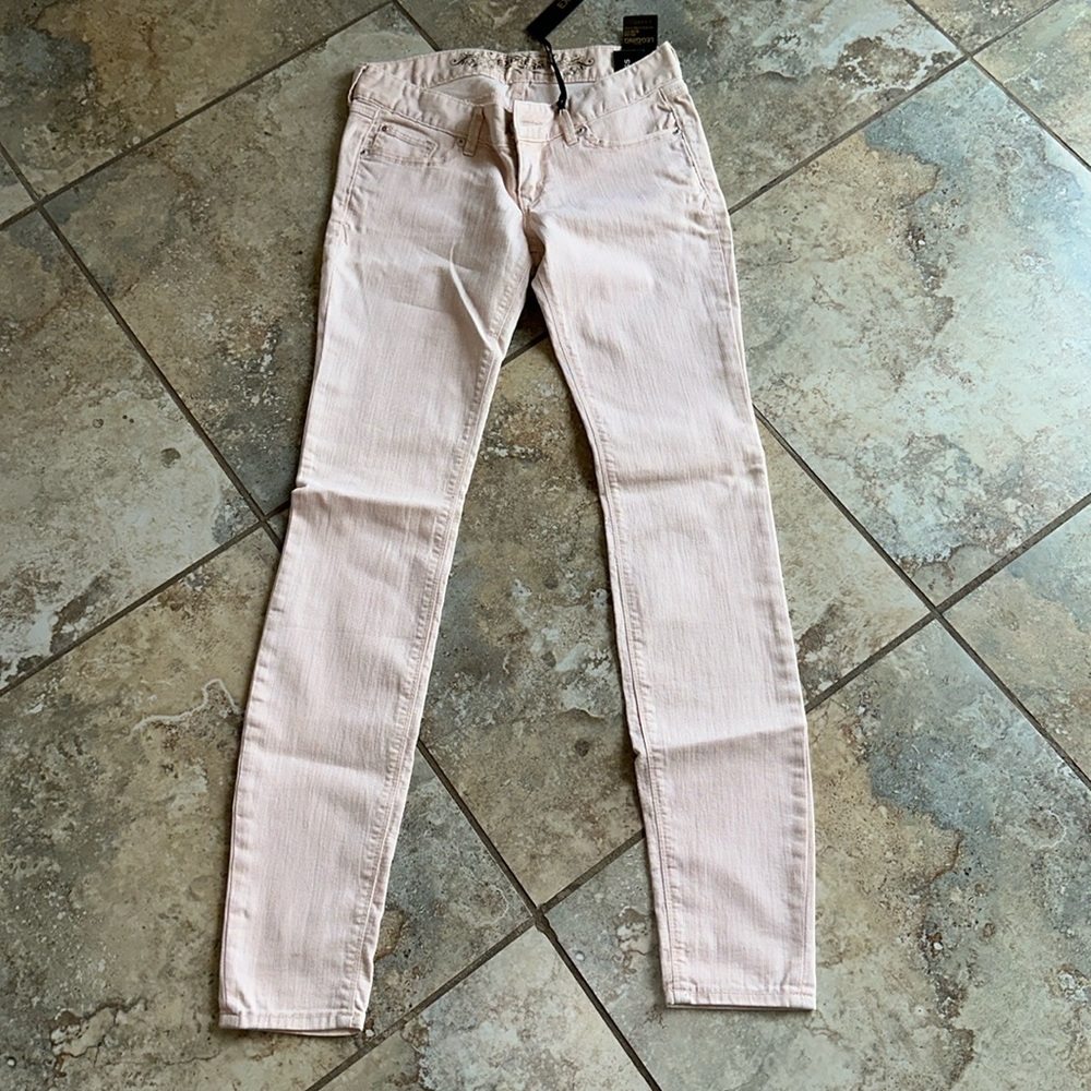 Pink low rise express leggings. New with tags never worn. Size 2